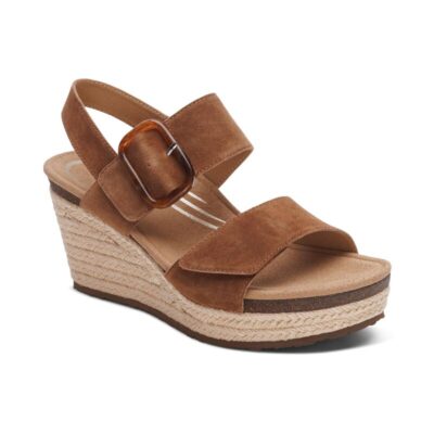 Aetrex Women's Ashley Arch Support Wedge in Scotch leather with braided detailing, memory foam footbed, adjustable ankle strap, and rubber outsole for comfort.