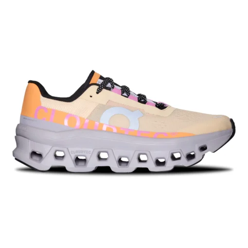 On Women's Cloudmonster in Frost/Wash color with oversized CloudTec® cushioning, Helion™ superfoam midsole, and durable rubber outsole for ultimate comfort.