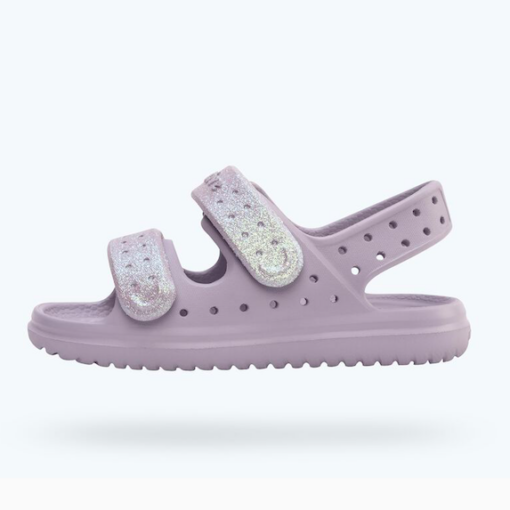 Native Kid’s Chase Bio-Bling Sandal featuring biodegradable glitter, dual adjustable straps, and a durable, water-friendly Sugarlite™ EVA construction.
