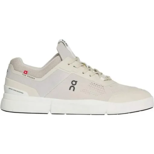 On Women's THE ROGER Spin sneaker in white and indigo, showcasing a breathable mesh upper, CloudTec® cushioning, and sleek low-profile design.