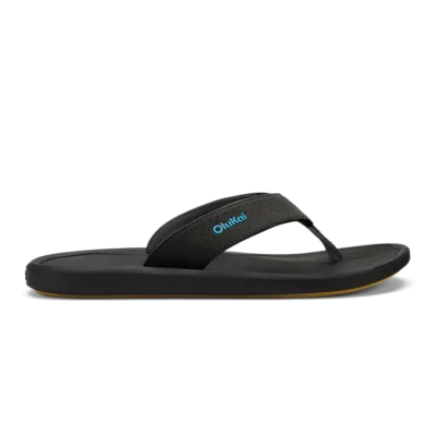 Olukai Men's Ki‘i Beach Sandal showcasing a sleek design with perforated straps, cushioned EVA footbed, and Wet Grip Rubber® outsole for superior traction.