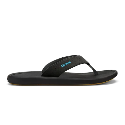 Olukai Men's Ki‘i Beach Sandal showcasing a sleek design with perforated straps, cushioned EVA footbed, and Wet Grip Rubber® outsole for superior traction.