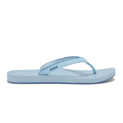 Olukai Women's ‘Uiki Sandal showcasing a sleek design with quick-drying straps, cushioned footbed, and non-slip Wet Grip Rubber® outsole for enhanced traction.