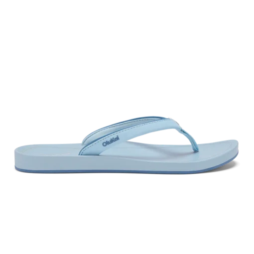 Olukai Women's ‘Uiki Sandal showcasing a sleek design with quick-drying straps, cushioned footbed, and non-slip Wet Grip Rubber® outsole for enhanced traction.