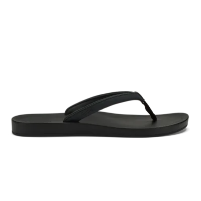 Olukai Women's ‘Uiki Sandal showcasing a sleek design with quick-drying straps, cushioned footbed, and non-slip Wet Grip Rubber® outsole for enhanced traction.