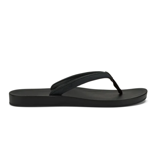 Olukai Women's ‘Uiki Sandal showcasing a sleek design with quick-drying straps, cushioned footbed, and non-slip Wet Grip Rubber® outsole for enhanced traction.