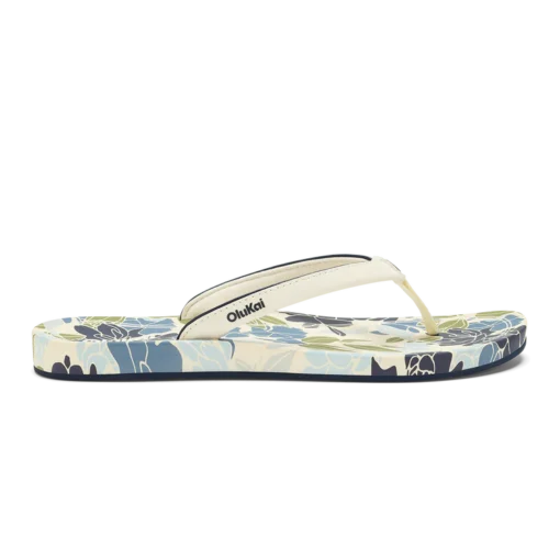Olukai Women's ‘Uiki Sandal showcasing a sleek design with quick-drying straps, cushioned footbed, and non-slip Wet Grip Rubber® outsole for enhanced traction.